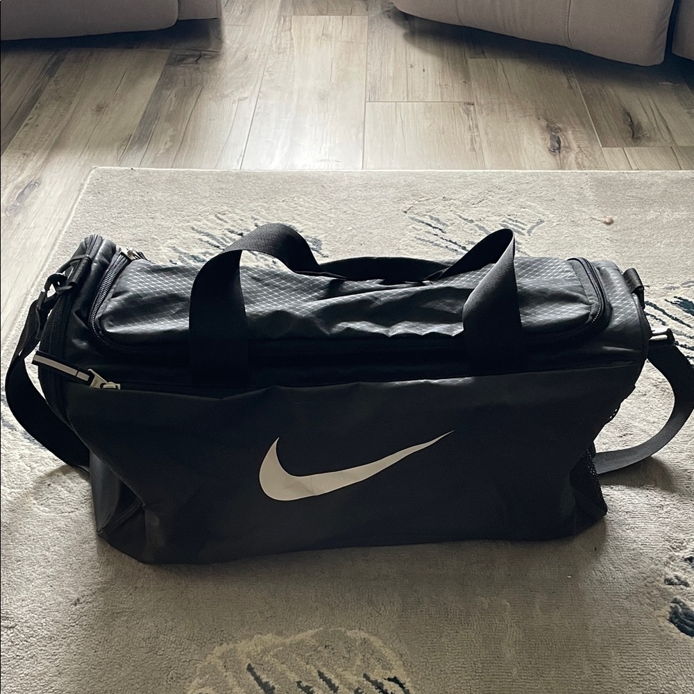 Nike Black Duffel Bag with White Swoosh Logo